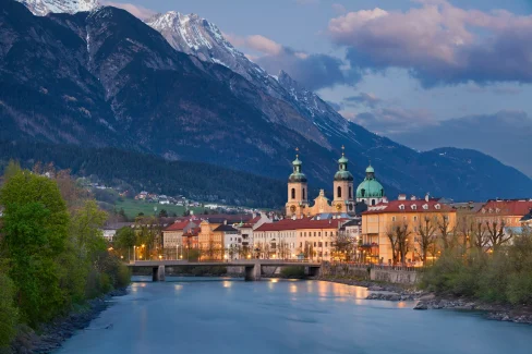 Crankwox location. Cityscape of Innsbruck, Austria, with mountains in the background